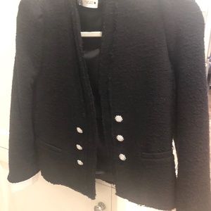 Black knit jacket with rhinestone buttons